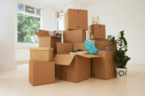 Professional man with a van loading items for a move in South Kensington